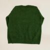 green knitted pullover